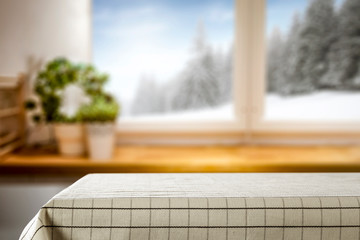 Table background of free space and winter window background