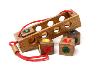 Wooden puzzle isolated on white background