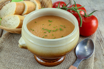 bowl of soup on a wooden table