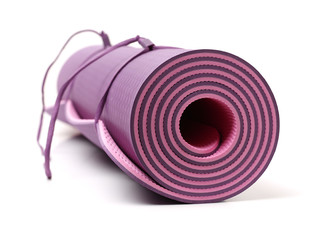 Yoga mat on white background