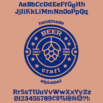 " beer " typeface. Vector hand crafted font in medieval style with hops. Good for posters, alcohol label and festival invitation.Letters and numbers.Vector illustration.