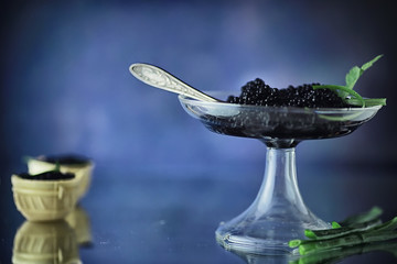 Fresh black fish roe. Beluga caviar served with ice.