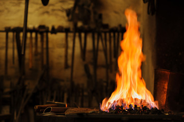 Blacksmith’s forge, hot flames and coal