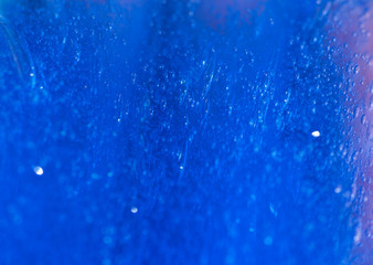 transparent slime texture with bubbles inside the gel.