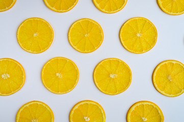 Fototapeta na wymiar fresh orange slices on white background. space for text