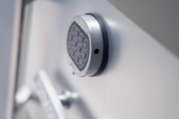 Silver bank vault with Safe lock code on safety box bank Protection. Deposit cell safe box with code lock. Code lock on the safe door.