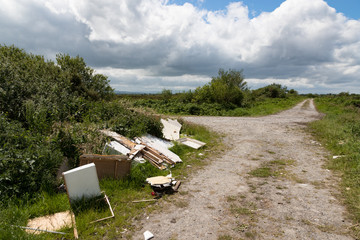 Illegally dumped shower and building materials in rural Ireland