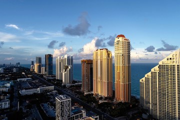 Obraz premium Aerial view of seascape sunset. Sunny Isles, Miami, United States. Great landscape. Vacation travel. Tropical travel. 