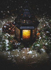 Winter Night Scene of a Glowing Lantern