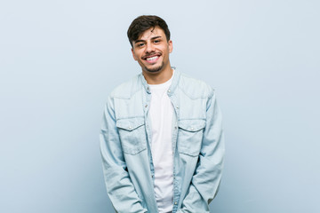 Young hispanic cool man happy, smiling and cheerful. - Powered by Adobe