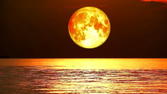 super full beaver blood moon move on night sky over wave on water in the sea, Elements of this image furnished by NASA