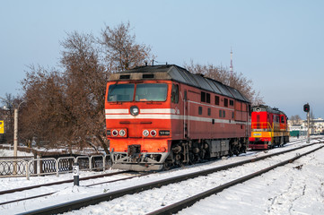 Passenger locomotive TEP70-0564 and shunting locomotive ChME3-3120 at the station Cheboksary of...