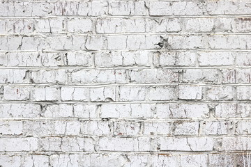 Old wall made of red brick, painted white in loft style for modern designer interior of room, bar or restaurant