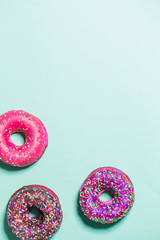 Group of glazed donuts on background