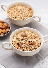 Granola, oatmeal with almond food background