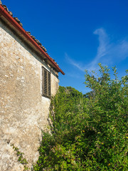 old mediterranean house and blue sky