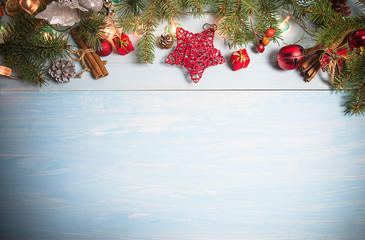Beautiful Christmas holiday frame on the light blue paint wooden background