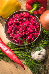 the feast in the village, traditional food, salted and ingredients, vegetarian food, vegetables mix.  Ingredients for cooking on a wooden cutting board. food photo