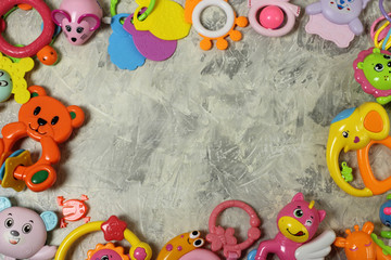 frame of toys on a gray background