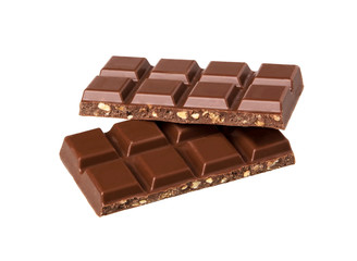 Milk chocolate pieces with nuts isolated on white.