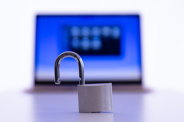 Privacy and data protection: Laptop and smartphone with locked padlock