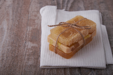 Handmade soap, spa, beauty skincare concept, handmade soap and dried flowers on old table