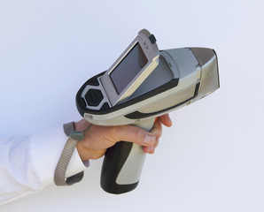 Man holds, Mining analyzer on white  background, macro close up view