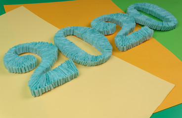 large numbers rounded two thousand twenty beautifully lie on four stripes of yellow, orange and...