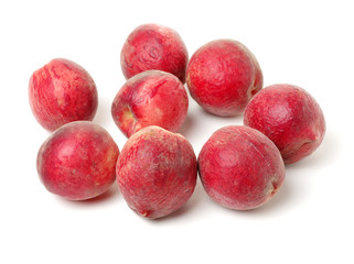 ripe peach on white background