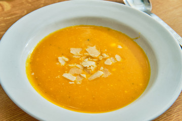 Hokaido pumpkin soup on white plate