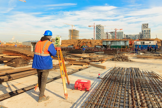 Bar bender fixing steel reinforcement for house concrete floor slab. construction worker Concrete pouring during commercial concreting floors of building in site and Civil Engineer. 