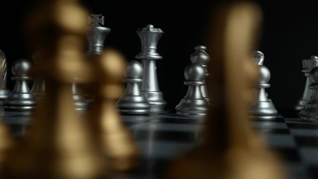 Close-up chessboard game and chess pieces on table, Dolly shot - 4K 2160p 24fps UHD footage