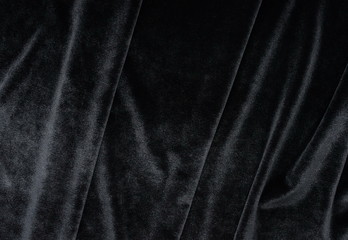 velvet texture black, dark grey color background , expensive luxury fabric, wallpaper. copy space