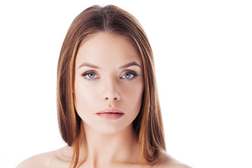 Fototapeta premium Skin care. Portrait of a young beautiful woman with clean and healthy skin.