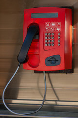 Red payphone. Red street phone.