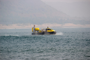 Fototapeta premium Hovercraft moving in Rushikonda beach, Visakhapatnam, India