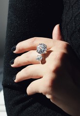 Tender jewerly on female hand, close up shot