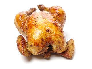 Whole roasted chicken against white background
