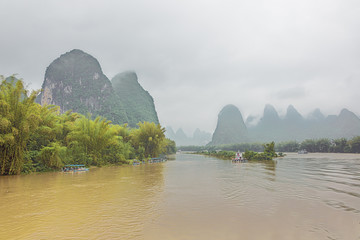 Several small boats at Xingpingzhen fishing village in the vicinity of Yangshuo near Guilin