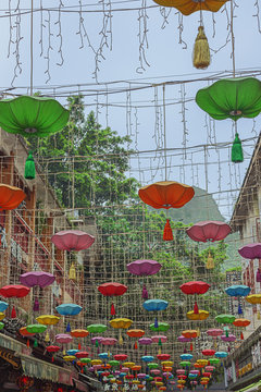Walking under street decoration in Yangshuo near Guilin
