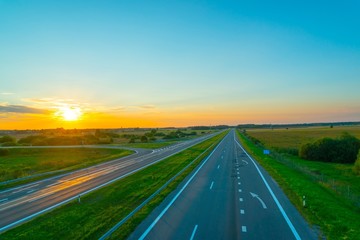 Empty motorway at sunset