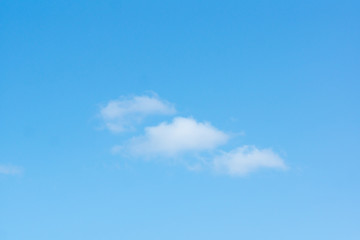 blue sky with light white clouds