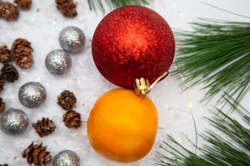 Christmas background. Fir branches and toys.