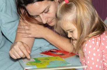 Mother. Baby. Girl. Read. Happy. Moment. Art