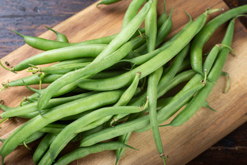 asparagus beans on a wooden background