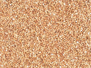 Buckwheat groats background with copy space. Healthy eating concept