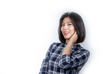 Beautiful smiling woman with clean skin, natural make-up, and white teeth on grey background