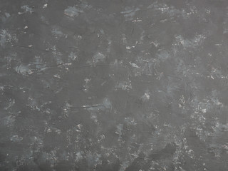Obraz na płótnie Canvas Black concrete background with white stains and spots