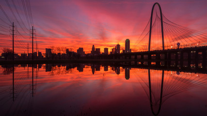 Dallas skyline sunrise reflecting in River