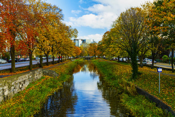 View from Huband Bridge Grand Canal Dublin with colorful Autumn / fall foliage, showing towpaths...